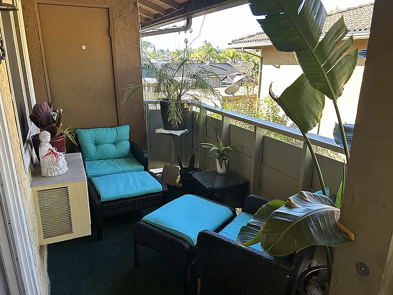 Outdoor balcony with view of the pool. It gets great afternoon sun ;)