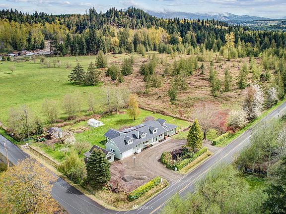 Acres of vacant land surround. 
