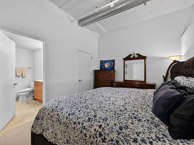 The main bedroom is huge and can comfortably fit a king sized bed and 3 dressers. Includes a large, walk-in, custom closet