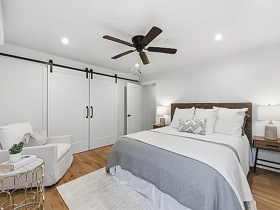 Bed 2, Extra Large Closet with "Barn" doors. double hanging and additional shelving