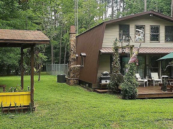 Shed on left w/Porch & House