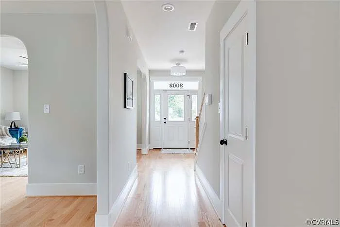 First floor, hallway, showing entrance door.