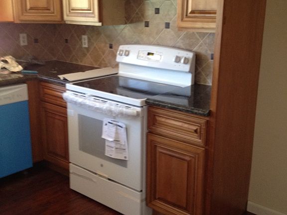 partial view of kitchen stove area