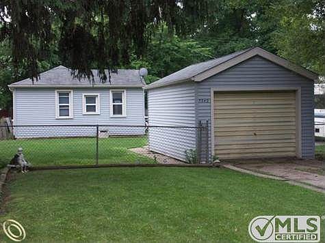 Front of house & garage