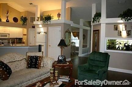 Great Room View into Kitchen~
						:
						Built in Aquarium with Office/Living Room Seen on Other Side