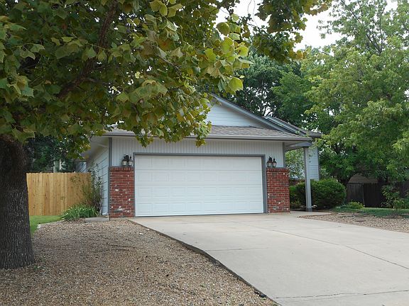 Widened driveway new fencing