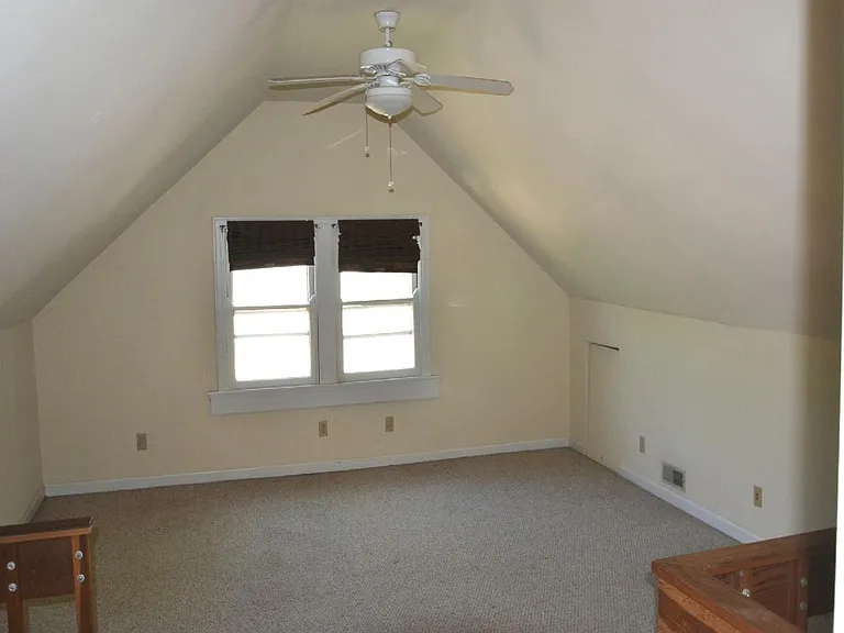 Upstairs bedroom looking toward front of house.