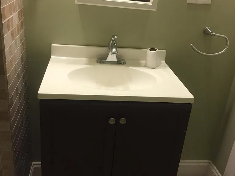 Full tile bathroom/shower with custom shelving