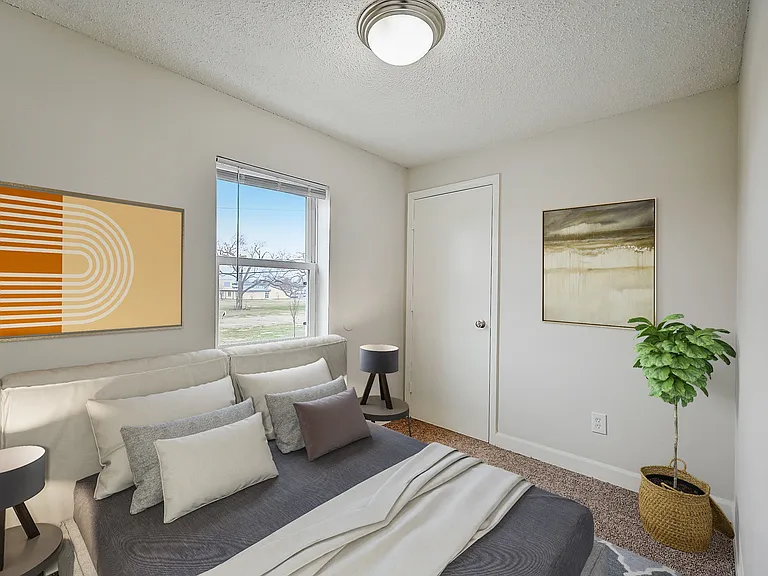 3 BR 1 BA Recently Renovated Townhouse Style Apartments featuring New gray carpet, Neutral paint scheme, Premium hardwood-style flooring, Neutral paint scheme, Upgraded light fixtures, New cabinets, Matching stainless steel appliances, Washer/Dryer, Air c