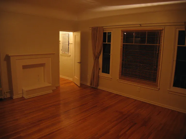 200 Living Room and large closet with window used by most as home office.