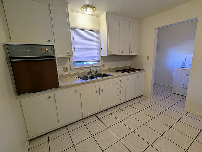 View from kitchen to front entry