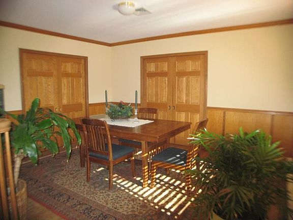 Formal Dining Room - Solid Wood Pocket Doors And Custom Trim. 