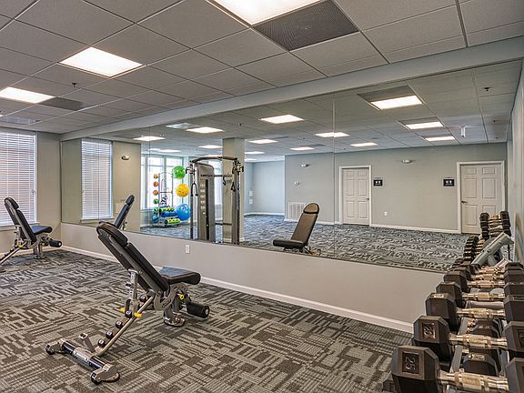 Lots of room with free weights and other equipment