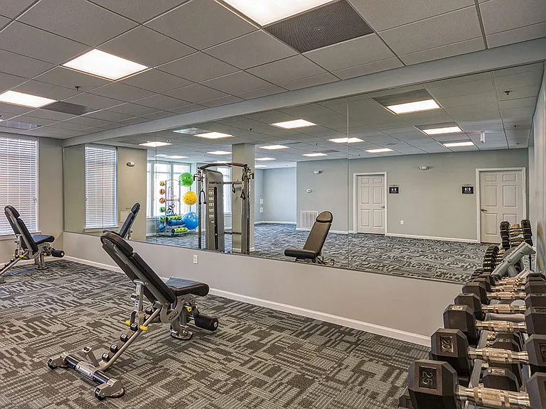 Lots of room with free weights and other equipment