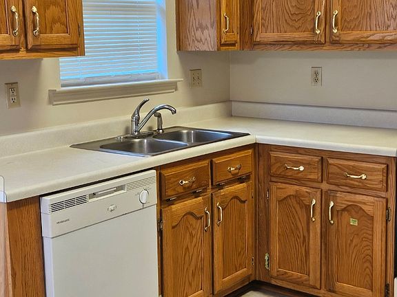 Kitchen has mulitple cabinet space, a closet pantry and laundry. Washer and Dryer, Stove, Refrigerator and Dishwasher provided. New blinds on all windows. Dining area adjacent with ceiling fan.