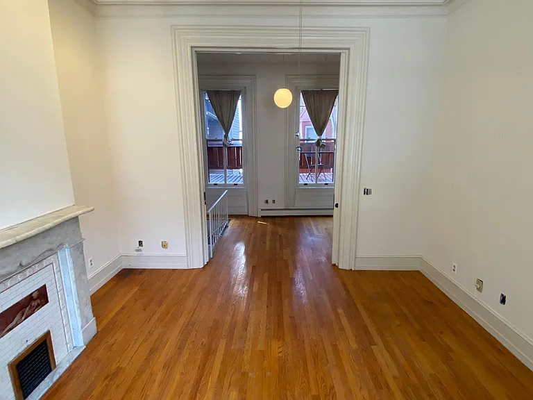 LOOKING OUT OF BEDROOM TO CLOSET AREA