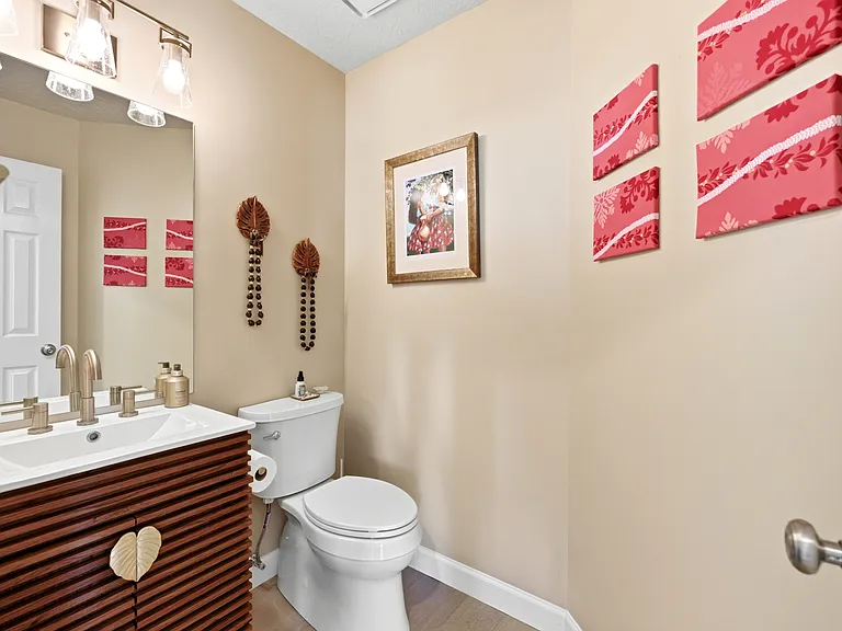 Convenient main-level half bath for guests.