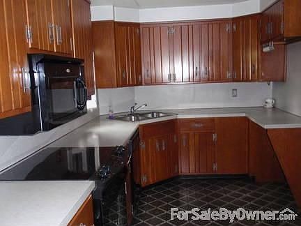 Kitchen
						:
						With a new mircowave, stovetop, and oven