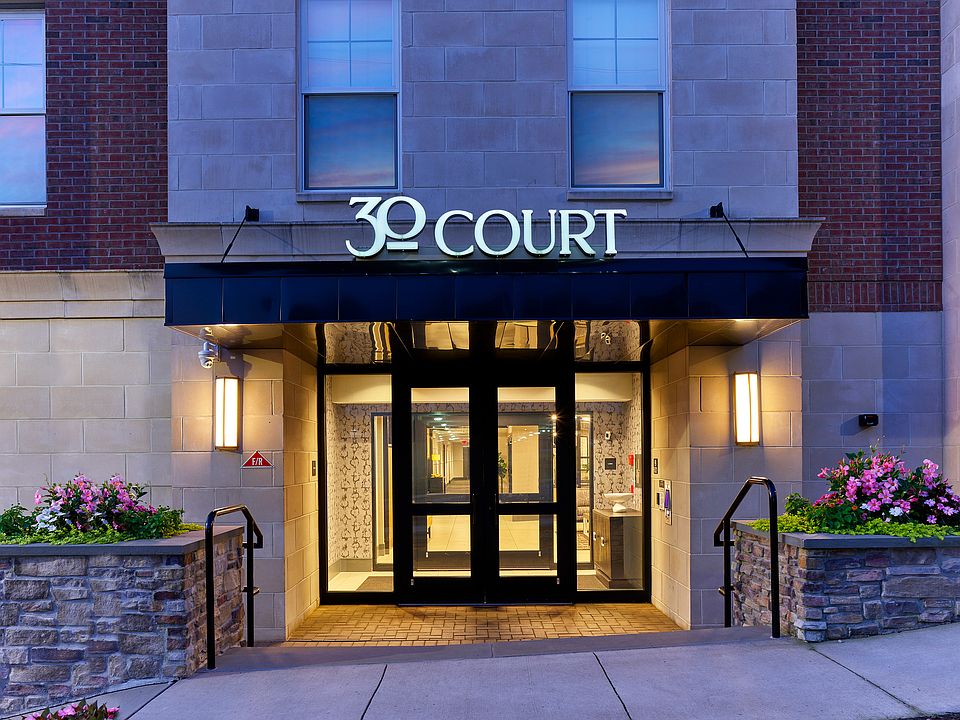 Welcome to 30 Court, where modern elegance meets inviting comfort.