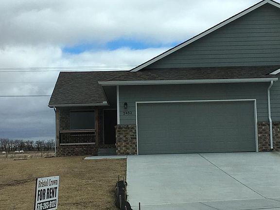 Duplex with a two car garage.