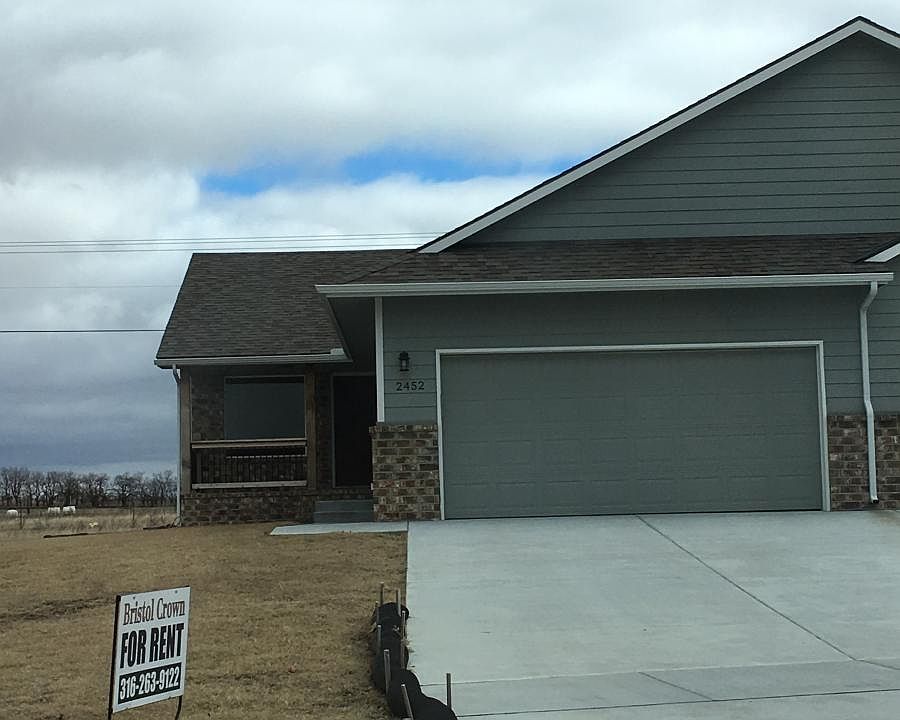 Duplex with a two car garage.