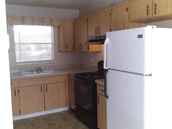 Kitchen flooring and fridge has been updated since this photo