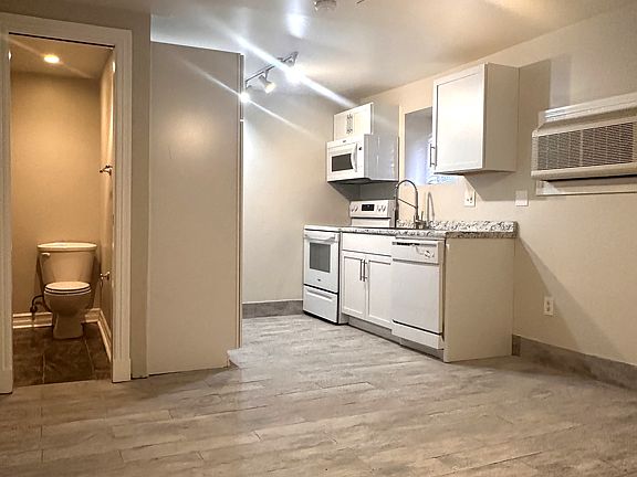 Studio Apartment 
Kitchen 
New ceiling Fan 
New Flooring