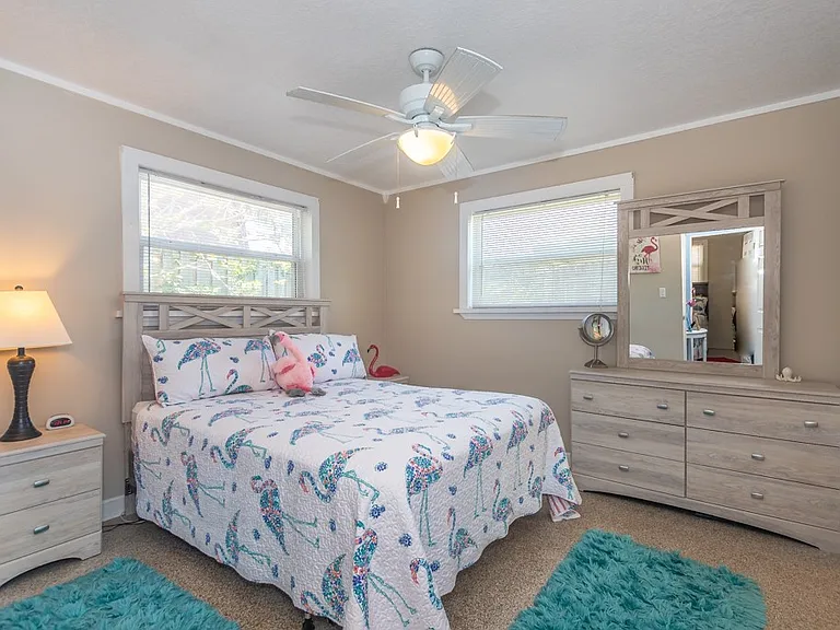 Master bedroom with 2 closets and attached bathroom