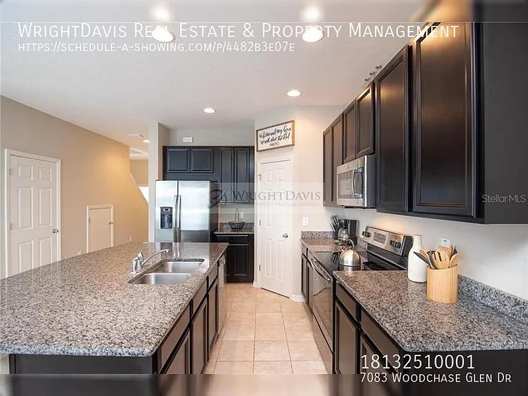 7083 Woodchase Glen Dr — Photo 4