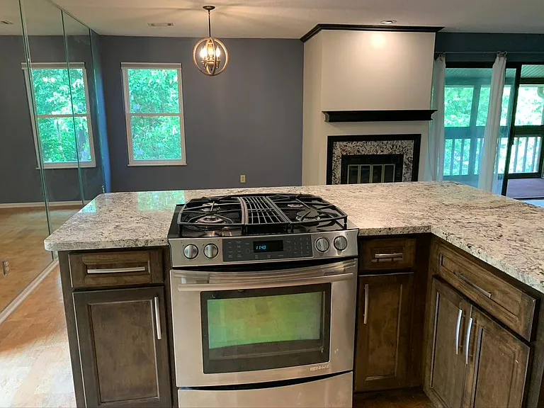 This Jennaire downdraft gas range is state of the art and the island has plenty of space to do your baking and cooking