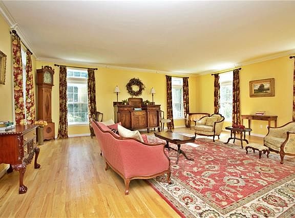 Sun filled formal living room, perfect for entertaining.