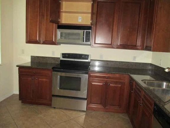 5th image of 179 E Thatch Palm Cir