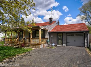 1437 S Belsay Rd, Burton, MI 48509