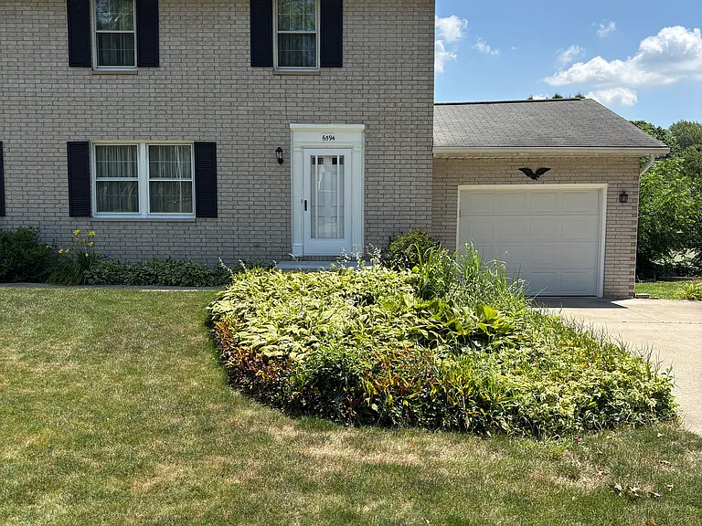 6594 Ravenwood Ave NW — Photo 2