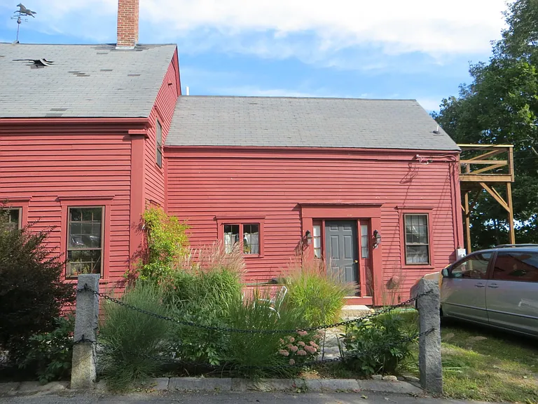 Apartment front door and driveway .Window on right is apartment kitchen.Upper right is apt. private deck overlooking waterfront view of East Boothbay Village!