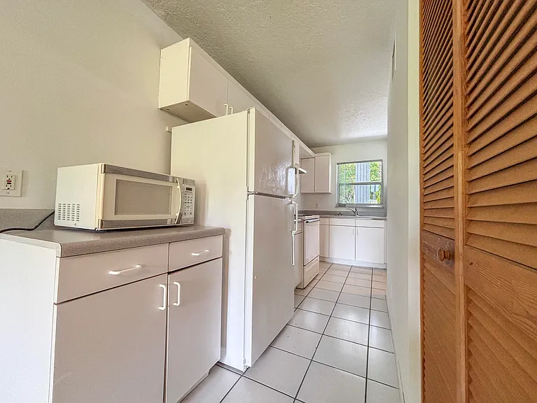 9013 NW 38th Dr #106 — Photo 2