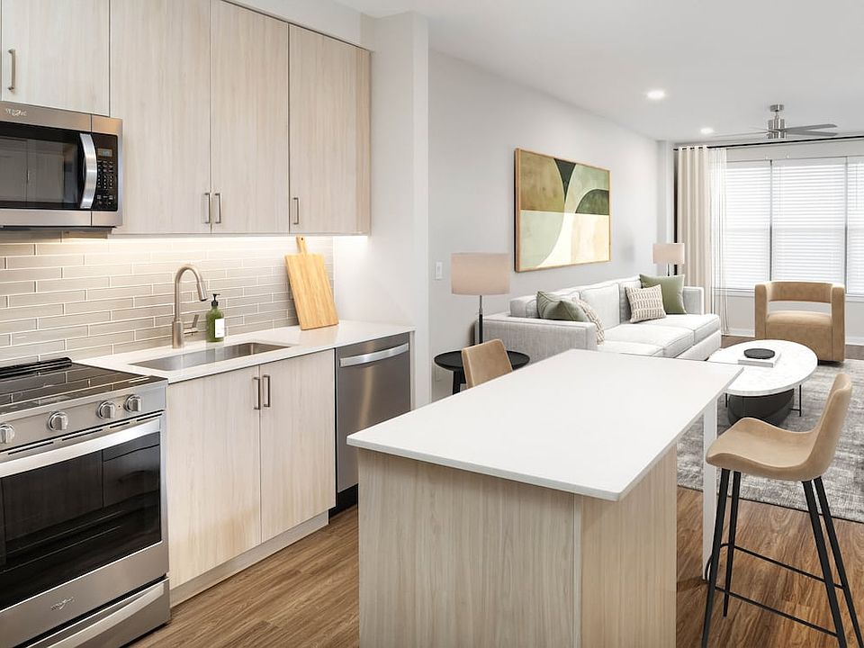 Upgrade Collection kitchen, living, and dining areas with hard-surface vinyl plank flooring