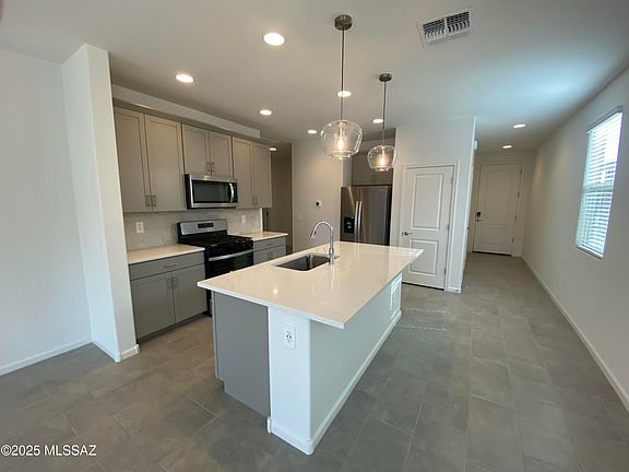 3rd image of 9871 N Solstice Ave