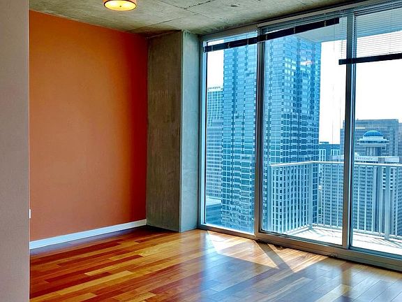 10 foot ceilings, beautiful hardwood floors and views for days!