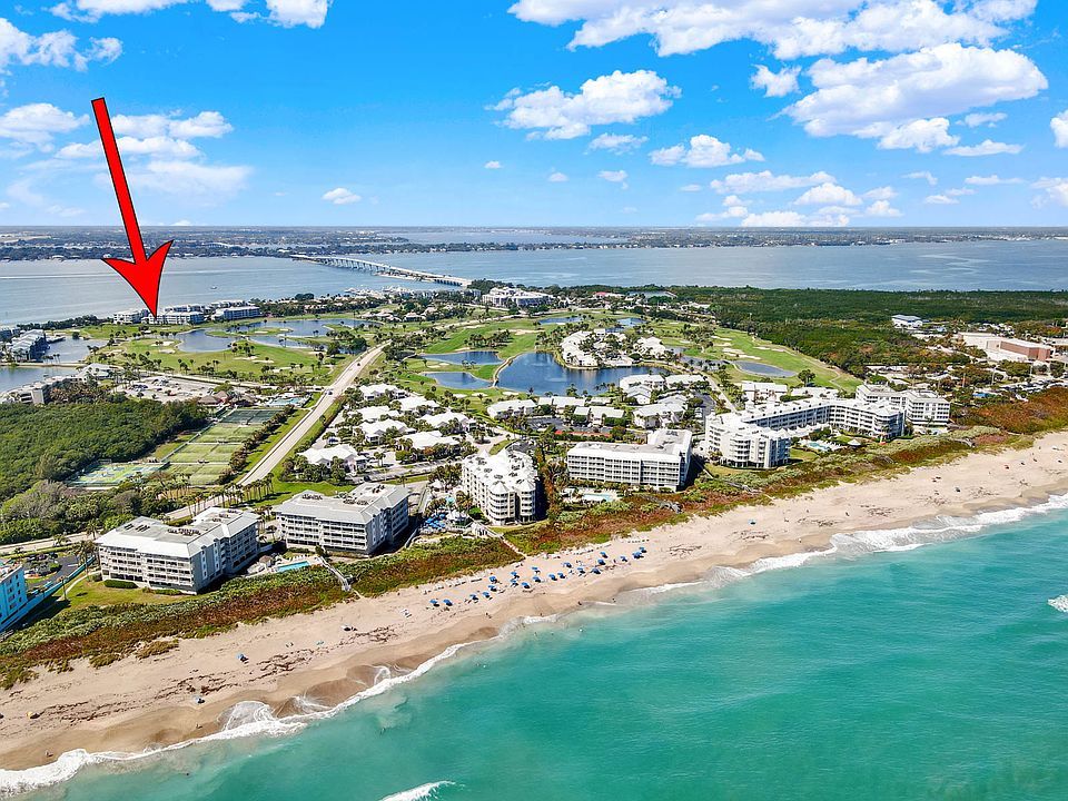 Riverbend Condominiums red arrow, with only 12 minute walk and you're at the beach!
