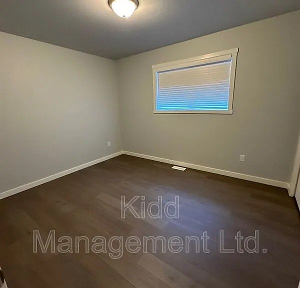 6936 Langer Cres #A — Photo 19