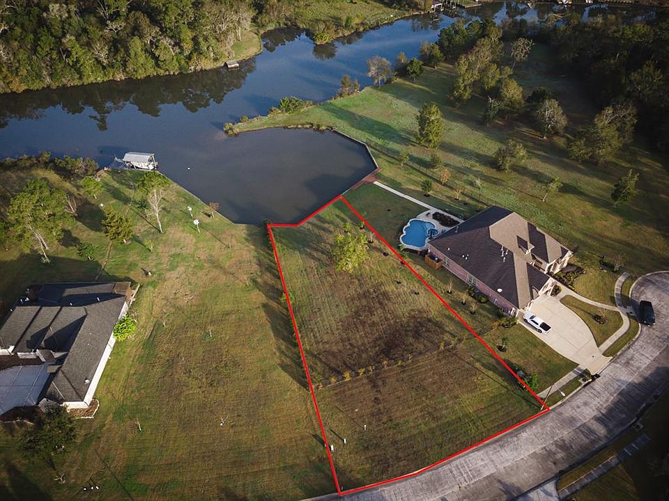 Large half-acre lot provides available access to build your own dock or just enjoy the water views!
