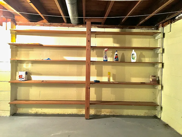 Basement storage, concrete floor with drain.