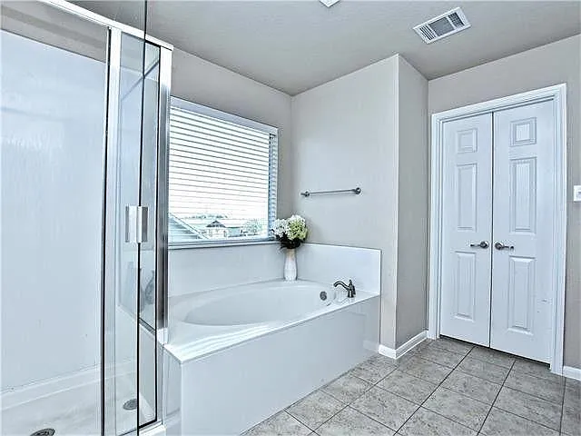 Double door entry into the master bath