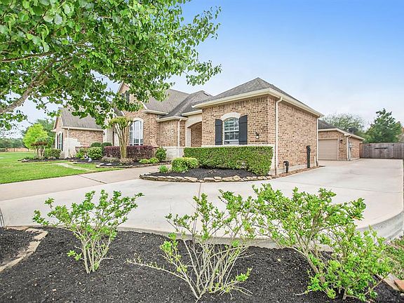 An added driveway creates additional parking, and leads to double gates with access to the backyard, making updating the landscaping easy!