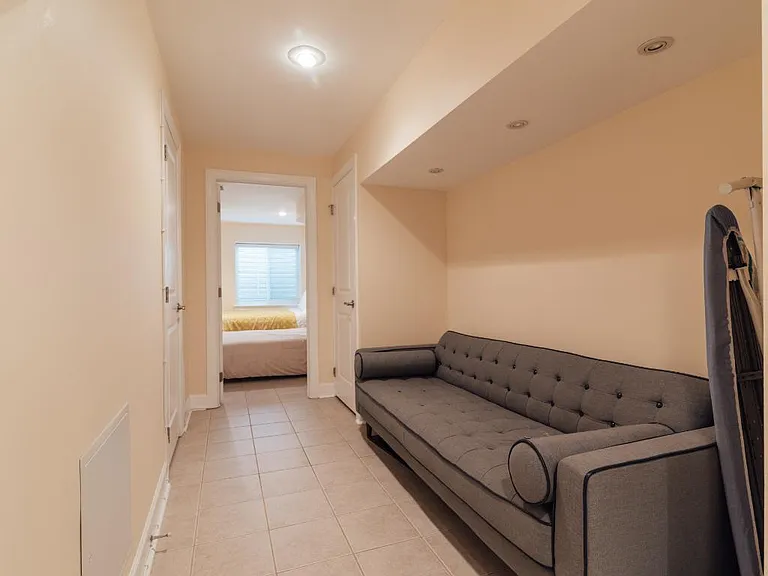 Downstairs hallway. Perfect for an office space, reading knook or guest bed.