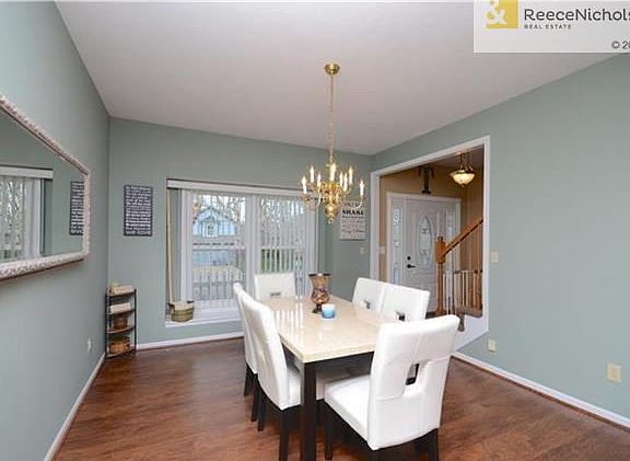 Note the New Dark Wood Laminate Flooring throughout