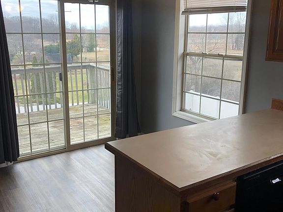 Kitchen with view of 2nd floor deck