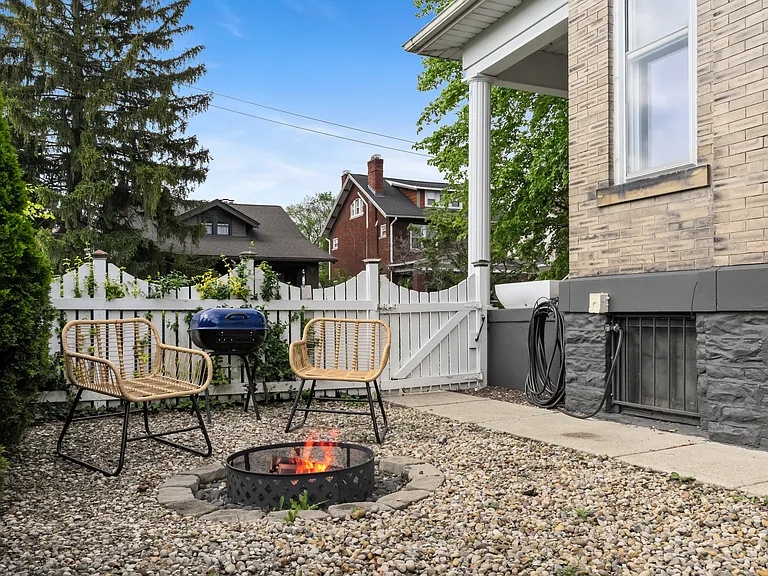 Side yard with fire pit.