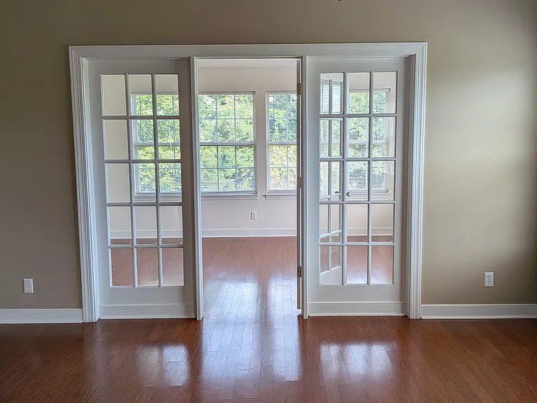 living room facing sunroom